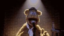 Fozzy bear looking around for a laugh and getting none