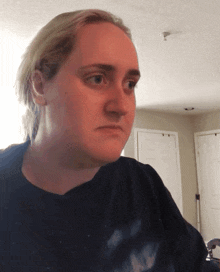 woman reacting to trying kombucha for the first time